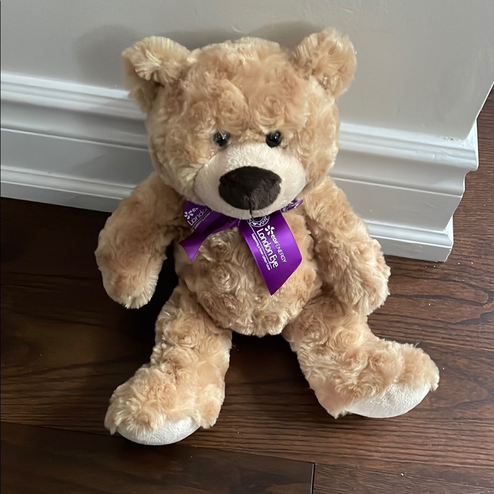 Tan and Purple Stuffed Animal Plush Toy
